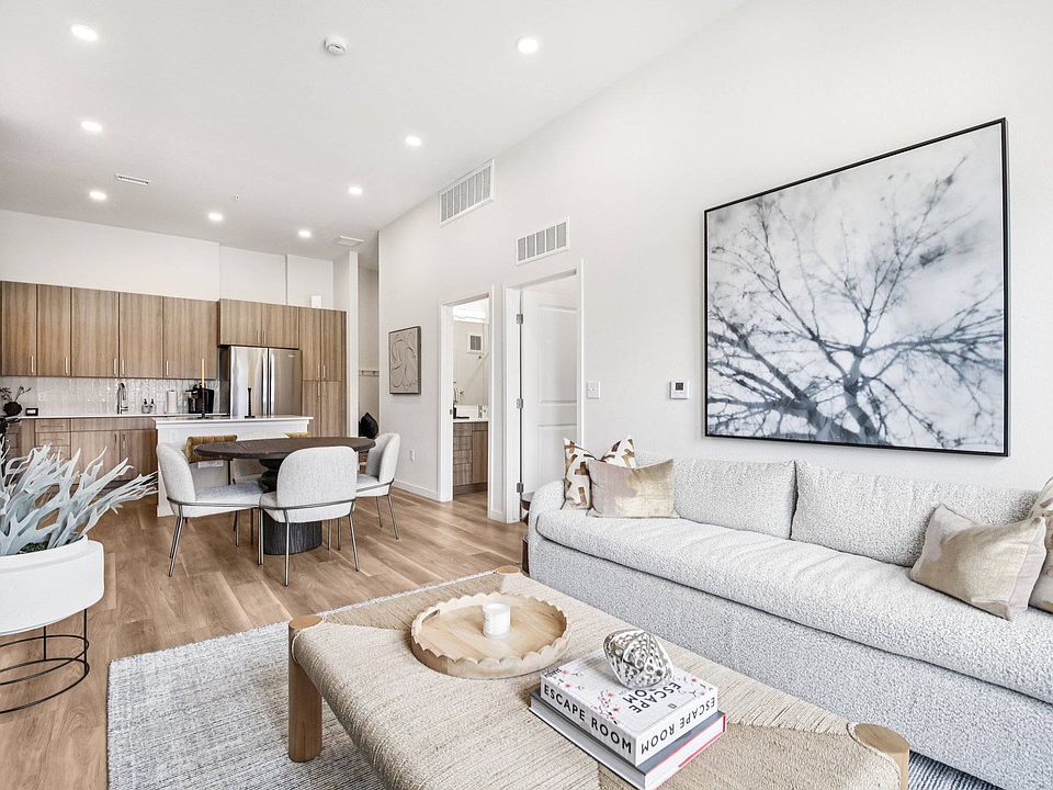 Hardwood-style floors throughout main living areas at The Madison