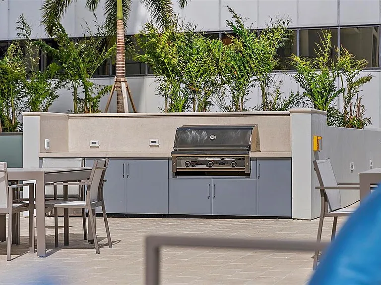 gas grills on pool deck