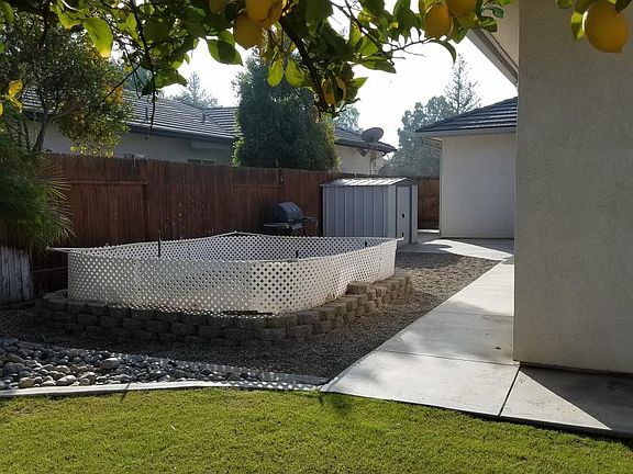 Raised garden and storage shed