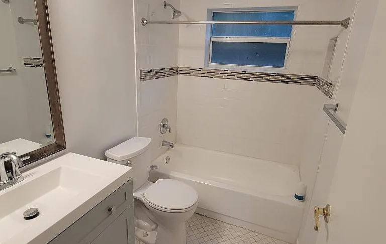 Bathroom pic showing window over tub!