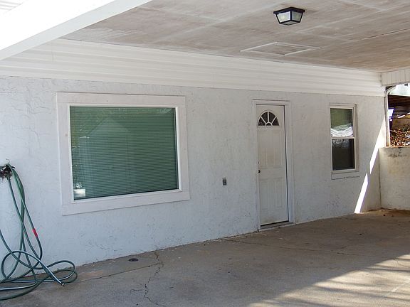 Carport entrance to basement