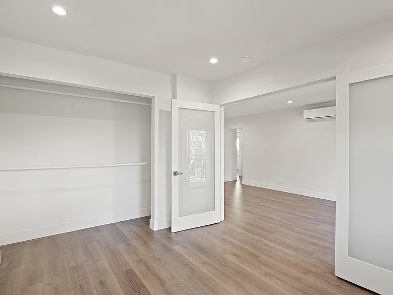 Bedroom with Double Doors and Large Closet