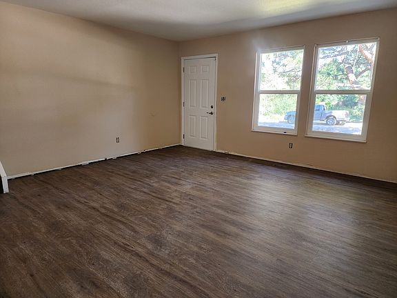 Living room wood look floors.