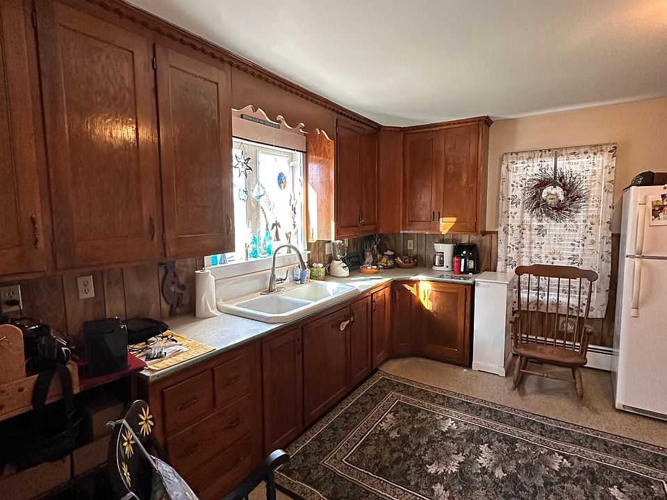 View of the kitchen while the current tenant is occupied. Furnishings not included.