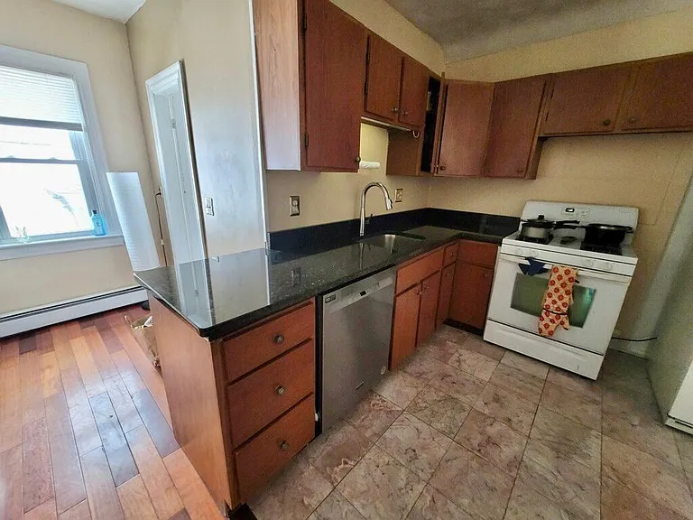 Kitchen w Granite Countertops and SS Dishwasher