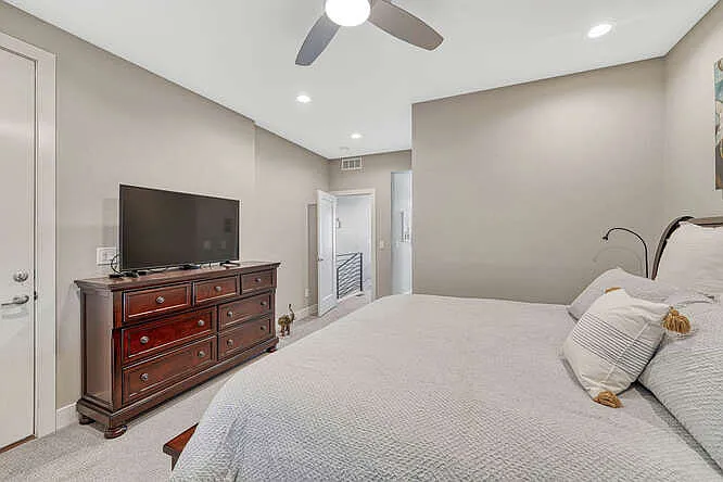Master bedroom suite with small balcony, large walk-in closet and large bathroom