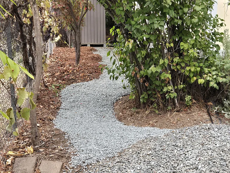 side entry, storage shed in back ground