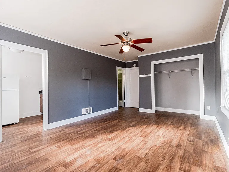 Seattle Apartments - Edwards on Fifth Apartments - Main Room, Kitchen, Entryway, and Closet