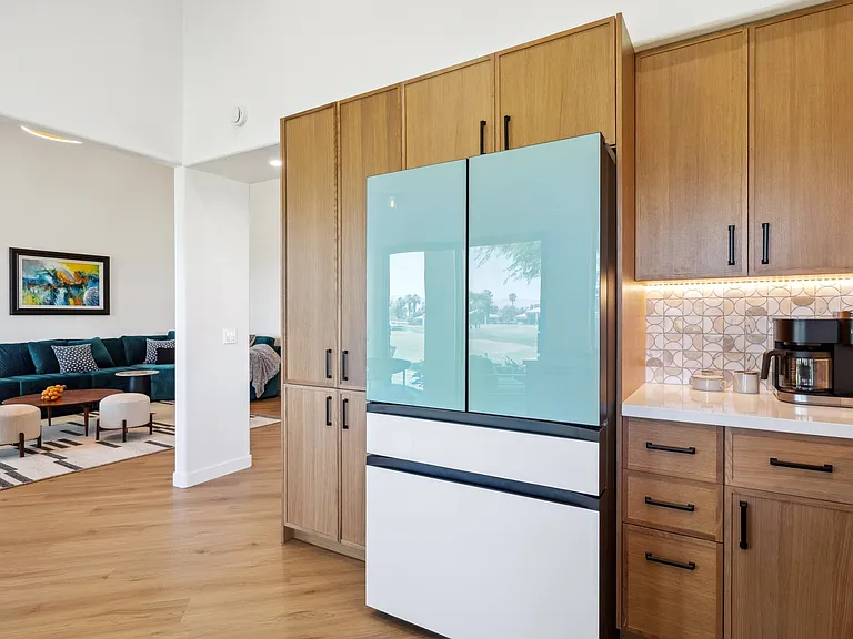 Kitchen opening onto living room