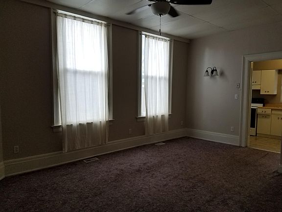 living room~ big windows and lots of light! with new paint