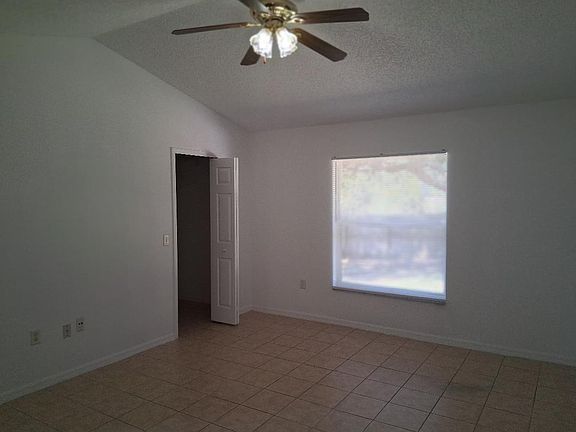 large primary bedroom with walk in closet