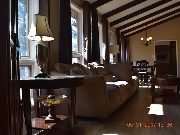 Living Room, back of the house lined with windows