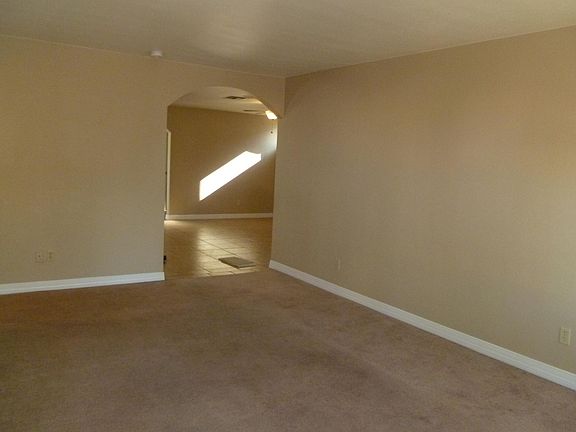 Living Room looking into Kitchen and den