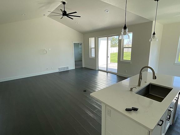 living room view from kitchen near laundry room