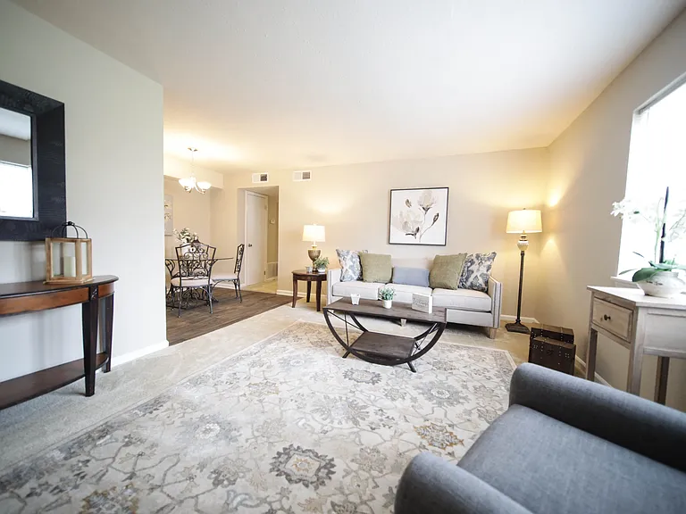 Spacious, landscaped outdoor terrace with lush seating, grills and a fire pit