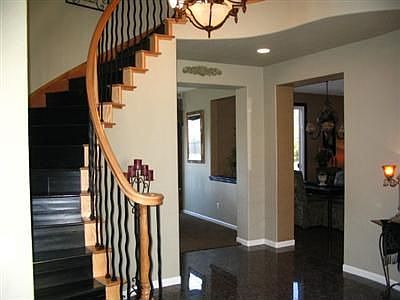 Two Story Beauty with upgraded stairwell, flooring, and lighting.