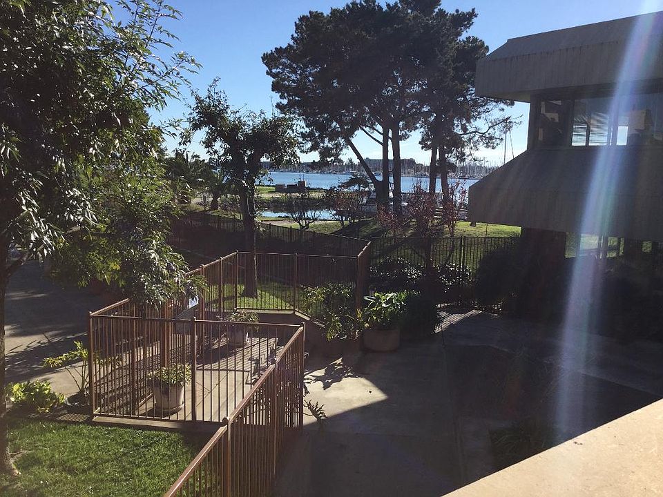 the picture shows the pool, hot tub and the play area