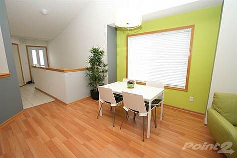 Open Floor Plan w/ Vaulted Ceilings.