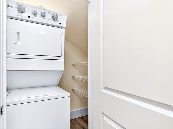 Large pantry with in-unit washer and dryer.