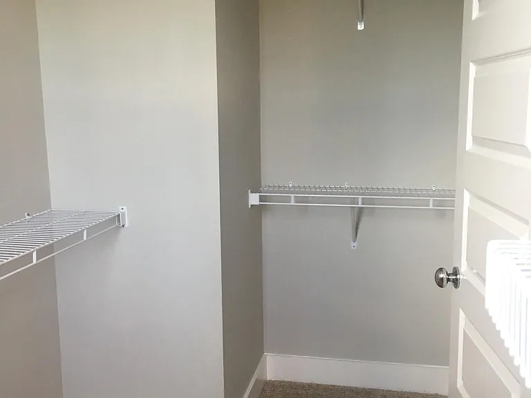 Primary bedroom closet.