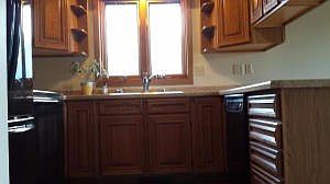 Bright kitchen with hardwood floor