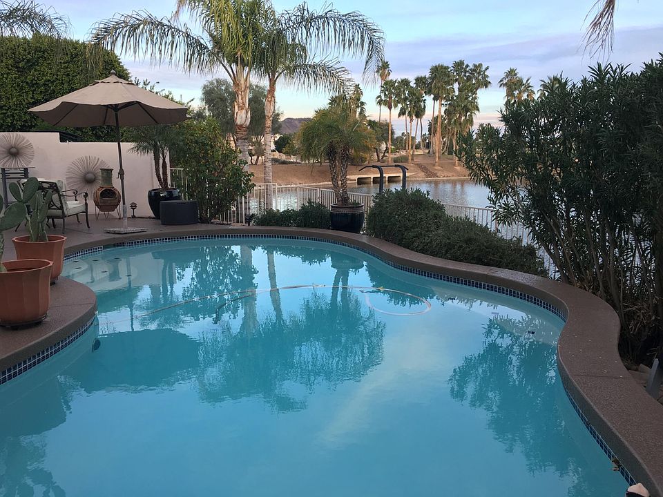 Pool with lake, commons and golf course views