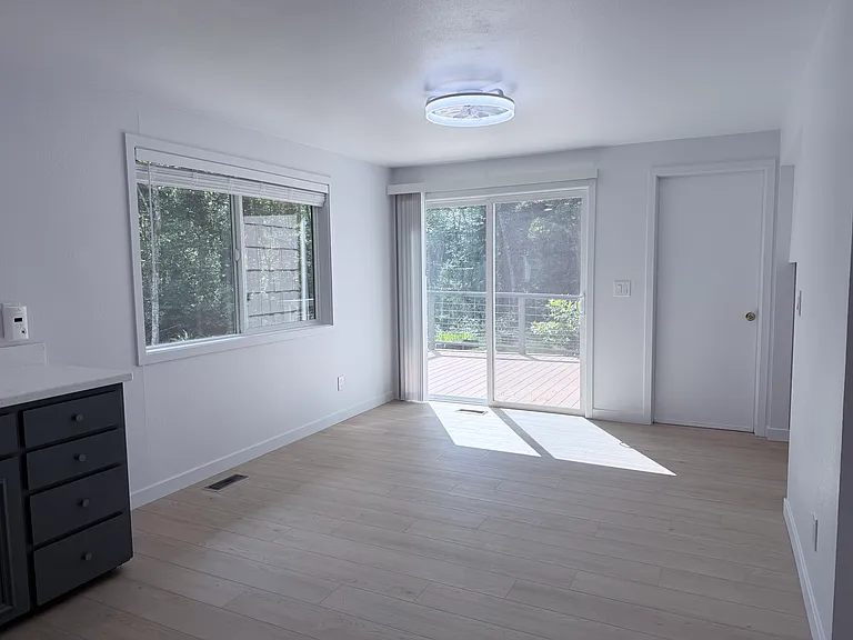 Sliding door opens to the entertainment deck.