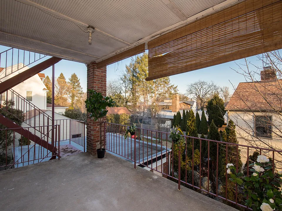 Landing from back entrance to porch immediately outside kitchen