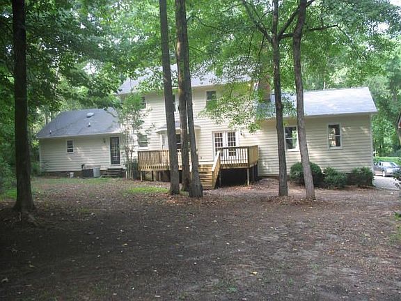 Back with large deck, workshop or potting shed, room for fenced area