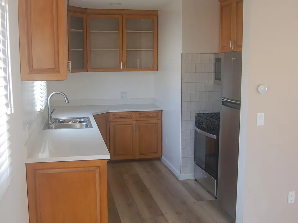 New stainless steel appliances, quartz counter top, cabinet storage including 
'Lazy Susan' cupboard.