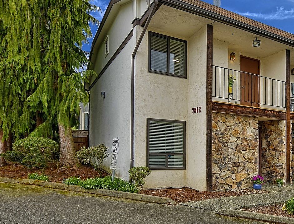 End Unit With Private Balcony.