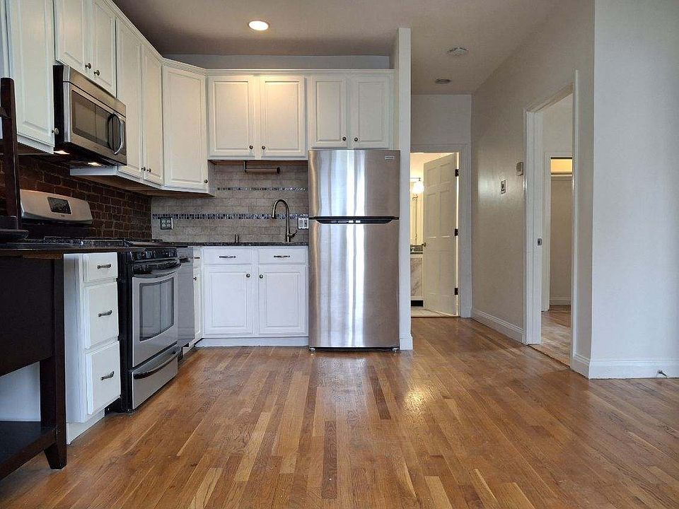 Open concept kitchen & living area with space to add an island/dining table!