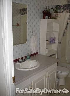 Bathroom
						:
						Full size bathtub and shower with large counter and storage.