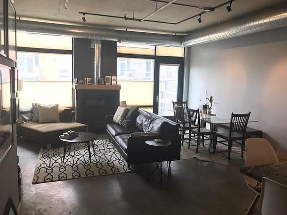 Large living area allows multiple living options. Blinds can be pulled up or down depending upon lighting/privacy preferences. Door opens onto private balcony with natural gas connection and grill.