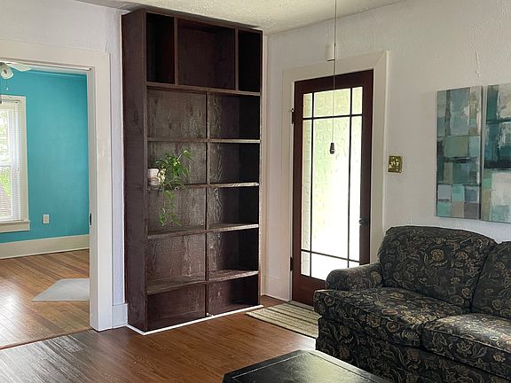 Built-in book shelves in living room.