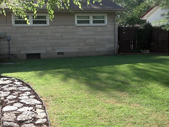 Formal yard and wood fence