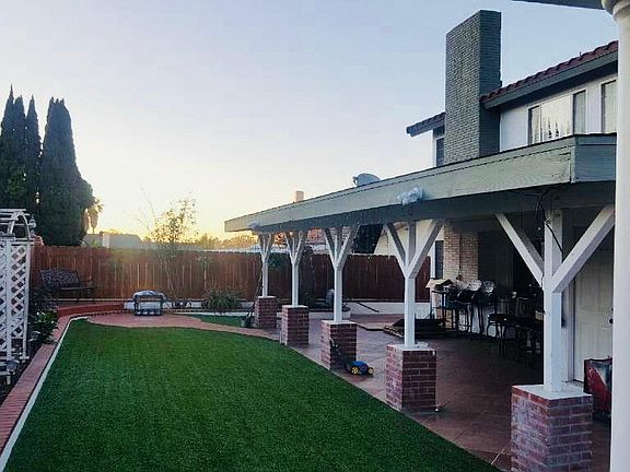 Backyard w/covered patio & outside restroom