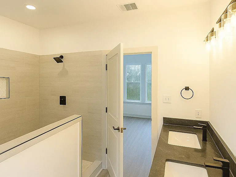 Designed for both comfort and style, this spa-inspired space offers the ideal place to unwind and recharge at the end of the day.