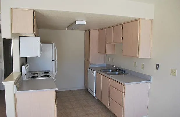Kitchen with Fridge, Range, and Dishwasher