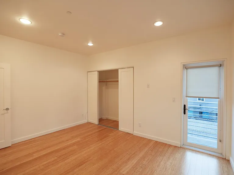 Rear Bedroom Closet & Balcony Door