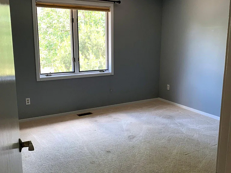 Main floor bedroom; has walk-in closet