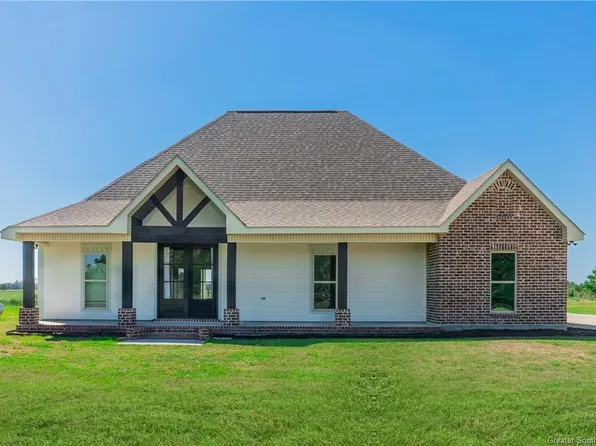 12129 Pousson Rd, Iowa, LA 70647