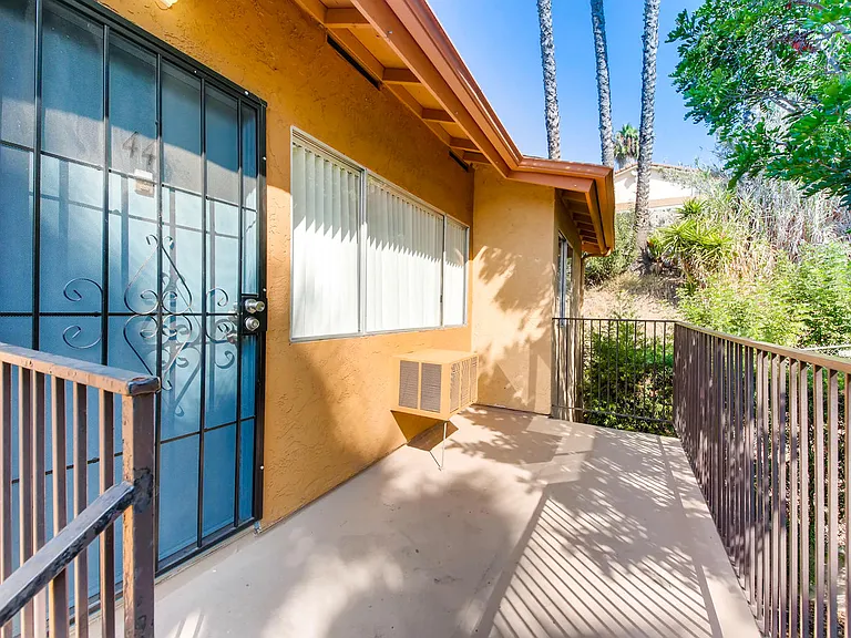 An Upstairs Front Entry Landing at Vista Flores Apartments
