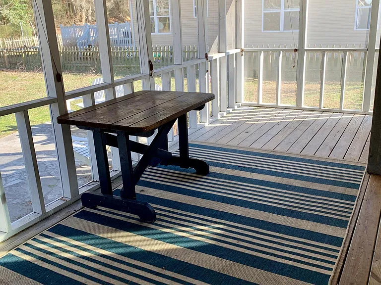 Screen porch is ideal for lounging, eating crabs and more!