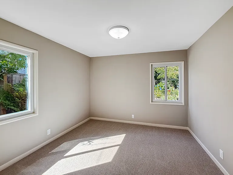 Downstairs Back Left Bedroom - Unstaged
