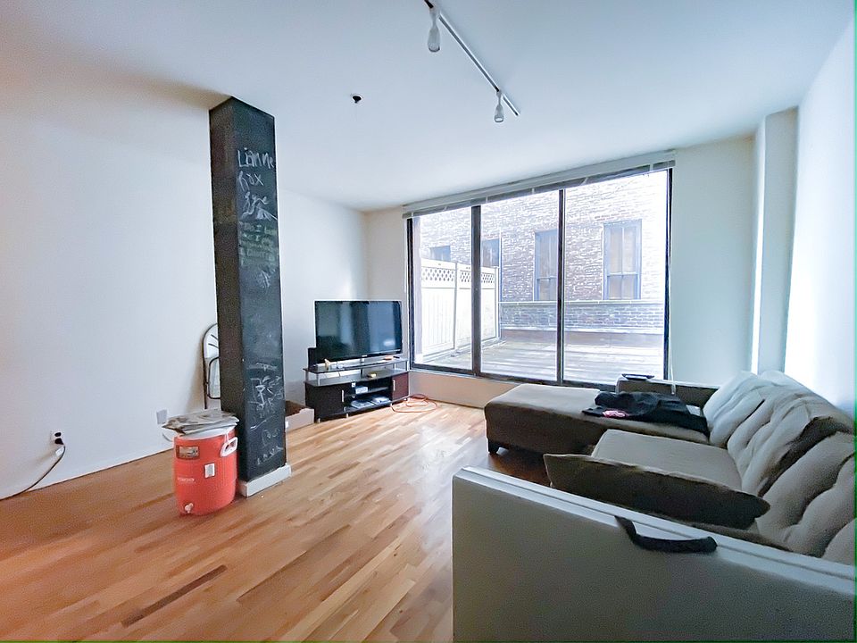 1st image of 110 E 13th St APT 2B