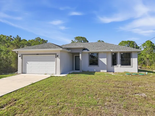 825 Carbon St E, Lehigh Acres, FL 33974