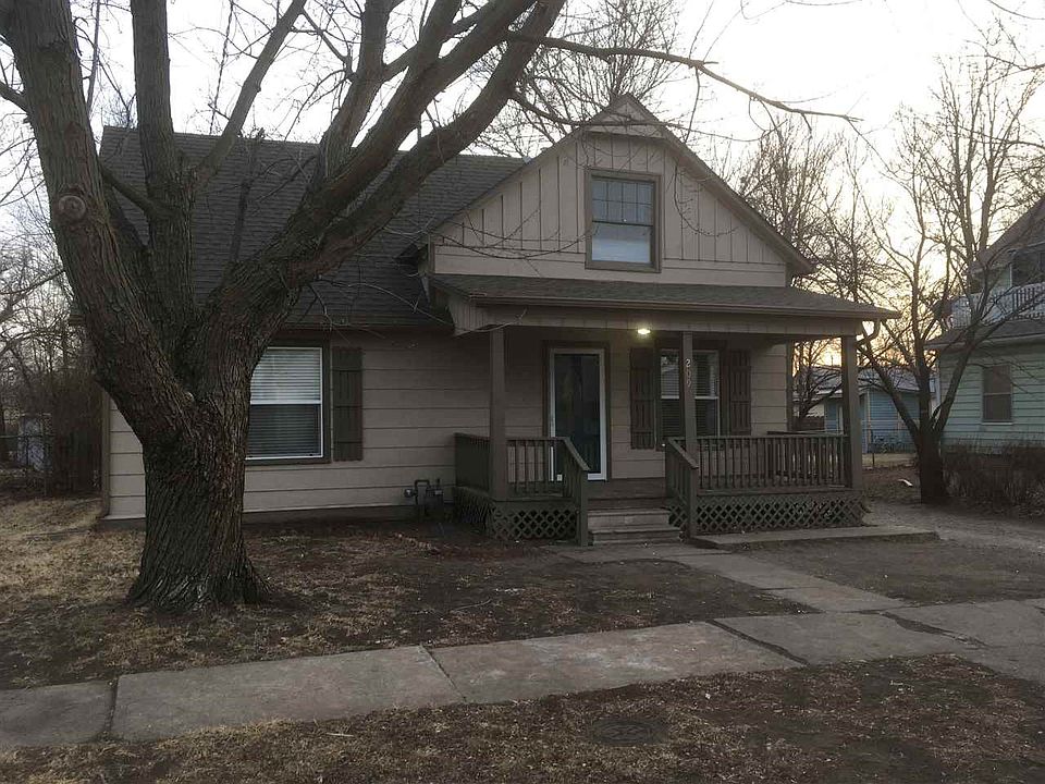 Nice front view with covered porch.