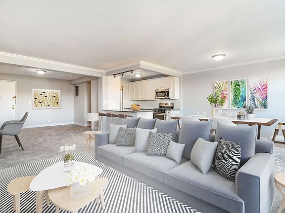 Open concept kitchen with plenty of room for entertaining! (virtually staged)