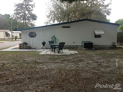 Back of Home with Patio